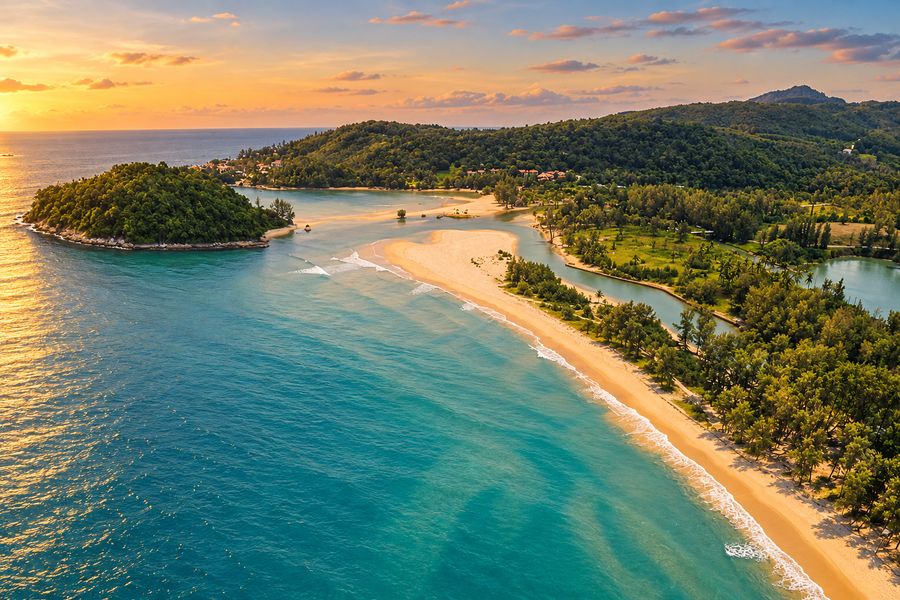 Aerial view of Layan beach and its islet at sunset